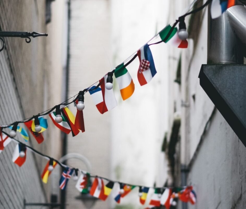 multicolored buntings on pathway